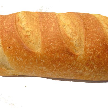 Ein länglicher, goldbrauner Brotkorb auf schwarzem Hintergrund.